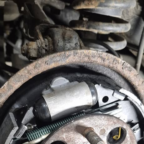 Close-up of brake assembly and rotor service work
